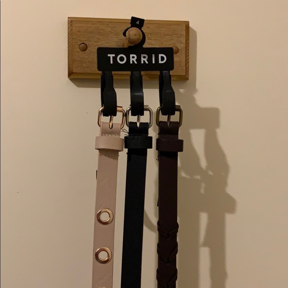 Torrid 3 pack belts. Size 4